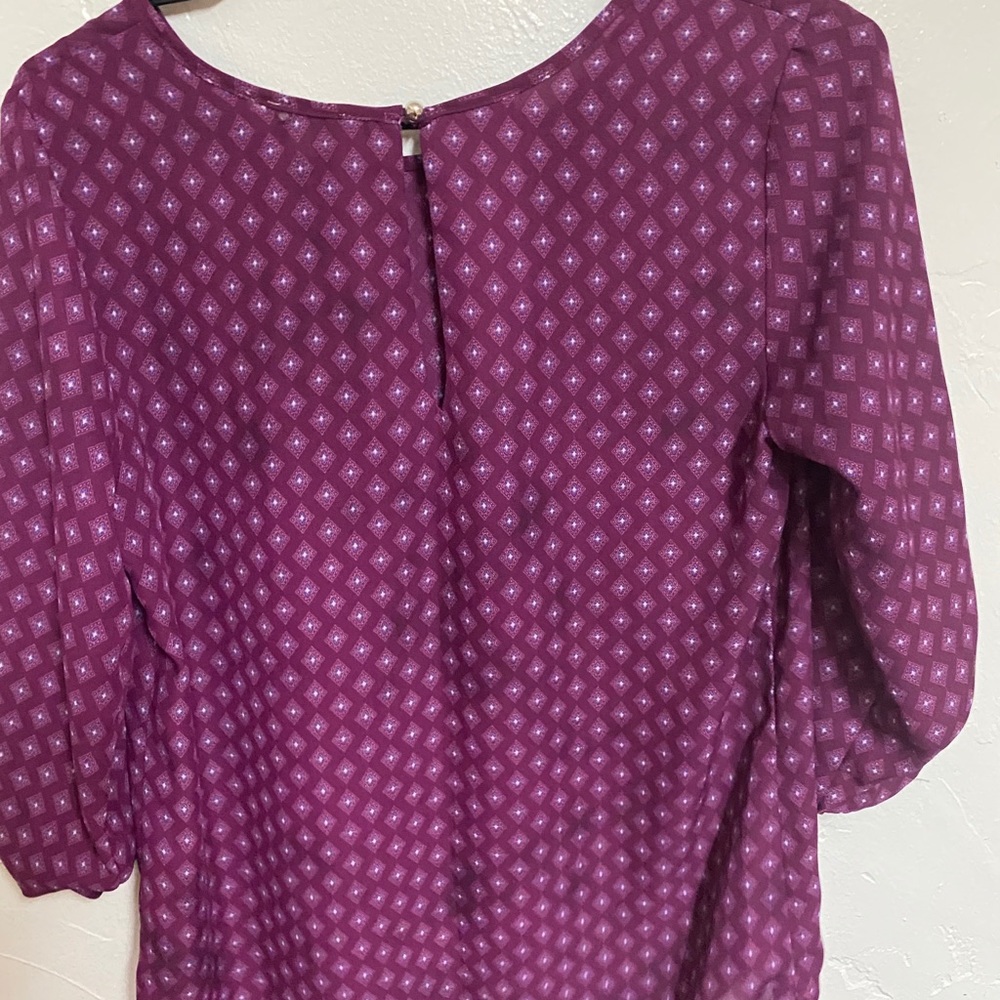 Two work attire tops